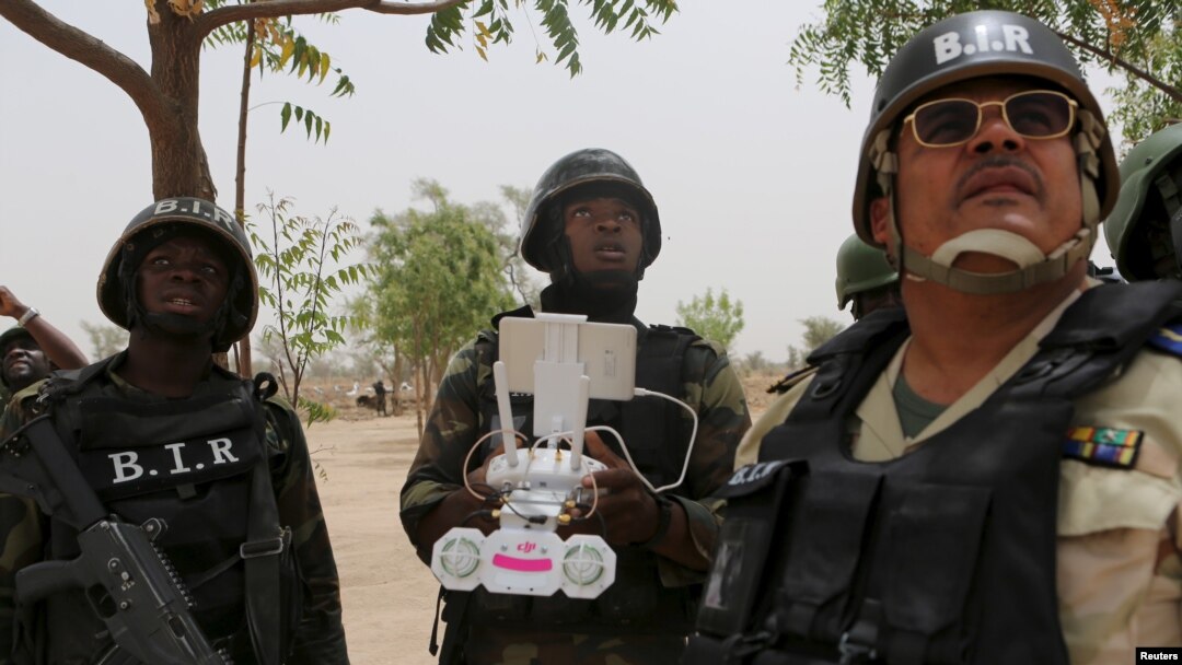 FILE - Cameroonian soldiers operate a surveillance drone at their base in Achigachia, Cameroon, March 16, 2016. An 8,700-strong regional force is seeking to stamp out Boko Haram.