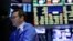 Suasana di Bursa Saham New York (8/7). (AP/Seth Wenig)