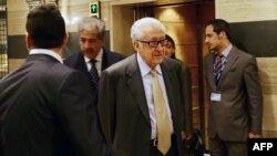 UN-Arab League envoy to Syria Lakhdar Brahimi leaves the Sheraton hotel on Oct. 30, 2013 in Damascus. 