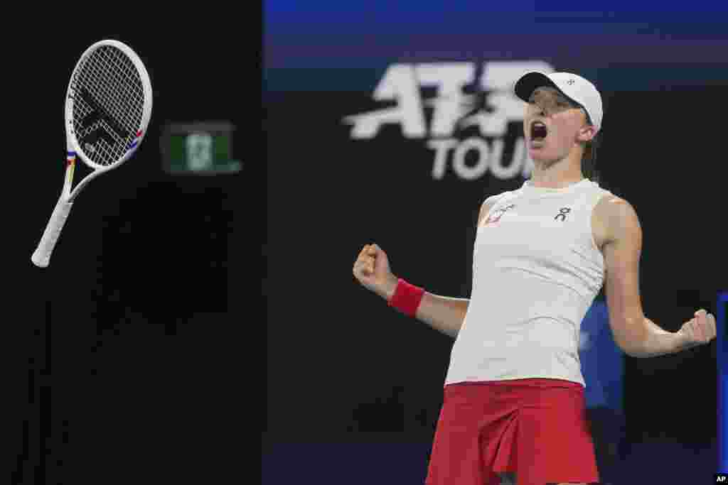 Poland&#39;s Iga Swiatek celebrates after defeating Britain&#39;s Katie Boulter in their quaterfinal match at the United Cup tennis tournament in Sydney, Australia.