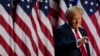 Republican presidential nominee former President Donald Trump points to the crowd at an election night watch party, Nov. 6, 2024, in West Palm Beach, Fla.