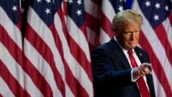 Republican presidential nominee former President Donald Trump points to the crowd at an election night watch party, Nov. 6, 2024, in West Palm Beach, Fla.