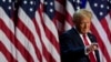 FILE - Republican presidential nominee former President Donald Trump points to the crowd at an election night watch party in West Palm Beach, Florida, Nov. 6, 2024.