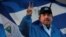 FILE - Nicaraguan President Daniel Ortega gestures during a march called "We walk for peace and life. Justice" in Managua, Nicaragua, Sept. 5,2018.