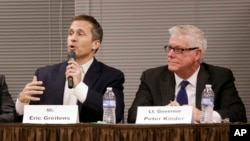 FILE - In this Nov. 3, 2015, photo, Missouri Republican gubernatorial candidates, former Navy SEAL Eric Greitens, left, and Lt. Gov. Peter Kinder participate in a forum in Jefferson City, Missouri.