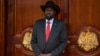 South Sudan's President Salva Kiir waits for the arrival of Eritrea's president Isaias Afwerki and Ethiopia prime minister Abiy Ahmed at the Presidential Palace in Juba, March 4, 2019. 