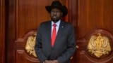 South Sudan's President Salva Kiir waits for the arrival of Eritrea's president Isaias Afwerki and Ethiopia prime minister Abiy Ahmed at the Presidential Palace in Juba, March 4, 2019. 