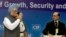 Indian Prime Minister Manmohan Singh greets top business leaders, as President of the Confederation of Indian Industry Adi Godrej watches in New Delhi, April 3, 2013.