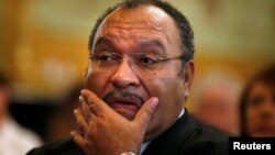 Le Premier ministre Peter O'Neill lors d'une conférence à Sydney, le 29 novembre 2012.