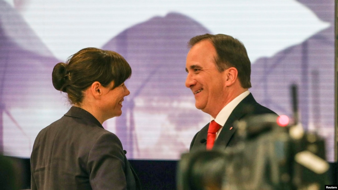 Asa Romson iz Partije zelenih i Stefan Lefven, lider socijaldemokrata i novi premijer Švedske, u Stokholmu 14. septembra 2014. 