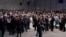 People gather during a stocktaking plenary session at the COP26 U.N. Climate Summit in Glasgow, Scotland, Britain, Nov. 13, 2021. Going into overtime, negotiators at the talks are still trying to find common ground on phasing out coal.