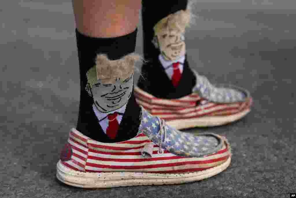 An person wears Donald Trump-themed socks before a campaign rally for Republican presidential nominee former President Donald Trump at Riverfront Sports in Scranton, Pennsylvania.