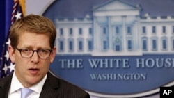 U.S. White House Press Secretary Jay Carney in the briefing room in Washington, January 18, 2012