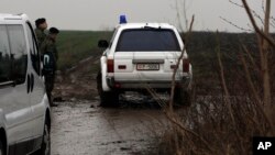 Vojna vozila u blizini mesta gde se srušio helikopter