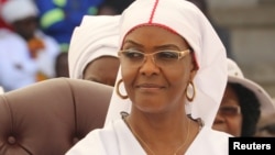 FILE - President Robert Mugabe's wife, Grace Mugabe, looks on during a national church interface rally in Harare, Zimbabwe, Nov. 5, 2017.