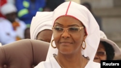 FILE - President Robert Mugabe's wife, Grace Mugabe, looks on during a national church interface rally in Harare, Zimbabwe, Nov. 5, 2017.