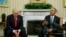 FILE - U.S. President Barack Obama, right, meets with President-elect Donald Trump in the Oval Office of the White House in Washington, Nov. 10, 2016.