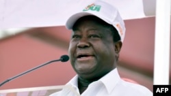 L'ancien président ivoirien et chef du Parti démocratique de Côte d'Ivoire (PDCI), Henri Konan Bédié, s'exprime lors d'un rassemblement au stade Félix Houphouët-Boigny, à Abidjan, le 22 octobre 2016.