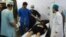 Medical staff attend to a victim of the blast at the main hospital in Kunduz January 26, 2013.