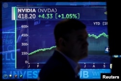 A screen tracks NVIDIA Corp. as a trader works on the floor at the New York Stock Exchange (NYSE) in New York City, U.S., October 23, 2023. (REUTERS/Brendan McDermid)