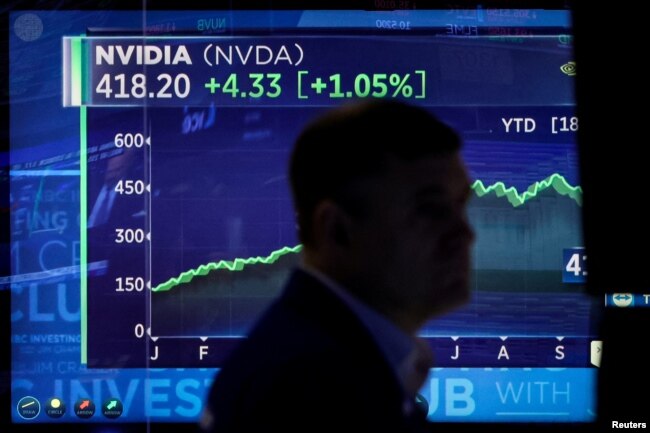 A screen tracks NVIDIA Corp. as a trader works on the floor at the New York Stock Exchange (NYSE) in New York City, U.S., October 23, 2023. (REUTERS/Brendan McDermid)