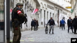 A military police officer stands guard near the scene of a terrorist attack in Vienna, Austria, Nov. 4, 2020. 