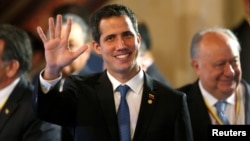 Venezuelan opposition leader Juan Guaido, who many nations have recognized as the country's rightful interim ruler attends a meeting of the Lima Group in Bogota, Colombia, Feb. 25, 2019. 