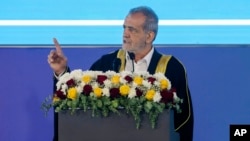 raq Iran
FILE - Iran's President Masoud Pezeshkian delivers a speech, wearing the traditional Arab dress, during his visit in Basra, Iraq, Sept. 13, 2024. Pezeshkian will attend the upcoming BRICS summit in Russia. 