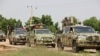 FILE - Nigerian soldiers patrol after gunmen suspected of belonging to the Islamic State West Africa Province (ISWAP) group raided a village, on Oct. 12, 2019. Nigeria has seen a surge of attacks by terror groups along its border with Niger in recent years.