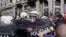 Riot police clash with protesters in Belgrade, Serbia, Sunday, March 17, 2019. 