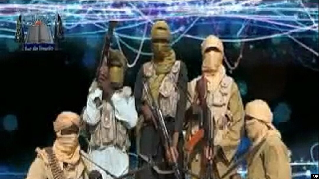 Wani hoton da 'yan kungiyar Ansaru suka bayar a watan Disambar 2012. Kungiyar ta fito da bidiyo na wani bafaranshe da ta sace.