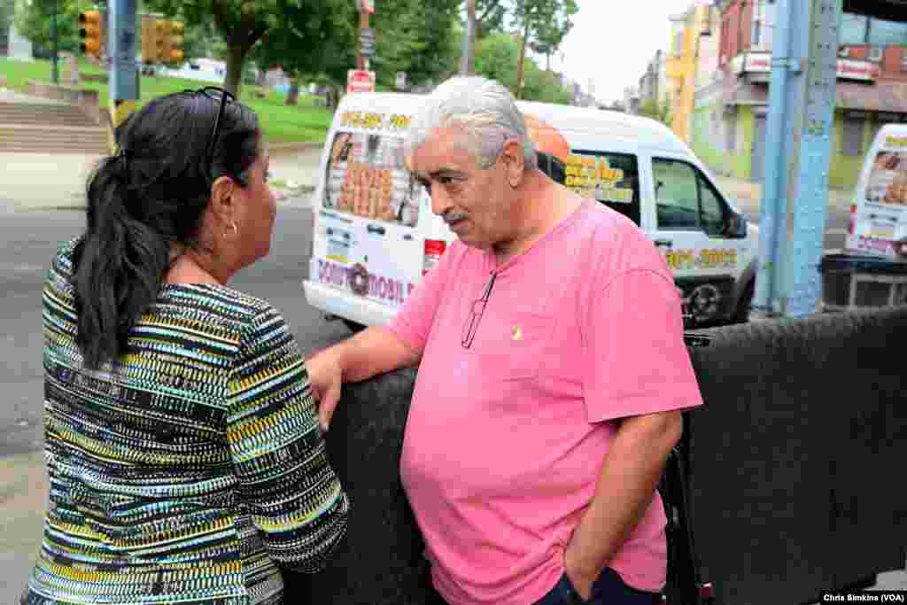 Councilwoman Maria Quinones-Sanchez speaks with Sam Kuttab, who is determined to keep his convenient store and donut delivery business open despite the current trouble with the opioid crisis.