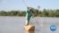 As Temperatures Rise, Water Evaporates in Mali Lake Giving Fisherman Hope