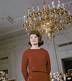 Jacqueline Kennedy poses during a tour of the White House East Room in Washington in 1962.