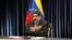 Venezuela's President Nicolas Maduro gestures as he talks to the media during a news conference at Miraflores Palace in Caracas, Venezuela, Sept. 18, 2018.