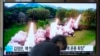 FILE - A TV screen shows a news program reporting on North Korea launching multiple rockets, at Seoul Railway Station in Seoul, South Korea, April 23, 2024.