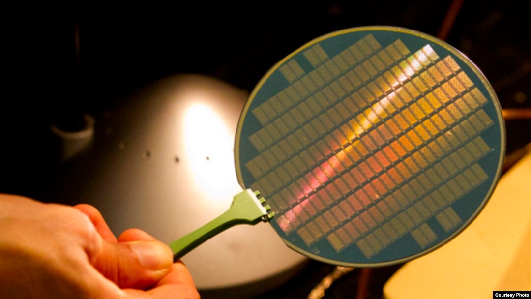 Max Shulaker a graduate student at Stanford University shows off the new material used to make new computers, August 19, 2013, at the Stanford School of Engineering. ( Photo by Norbert von der Groeben )