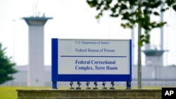 FILE - The federal prison complex is seen in Terre Haute, Ind., Aug. 28, 2020.