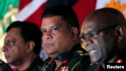 FILE - Chief of staff of the Sri Lankan army Shavendra Silva attends a news conference in Colombo, Sri Lanka, May 16, 2019.