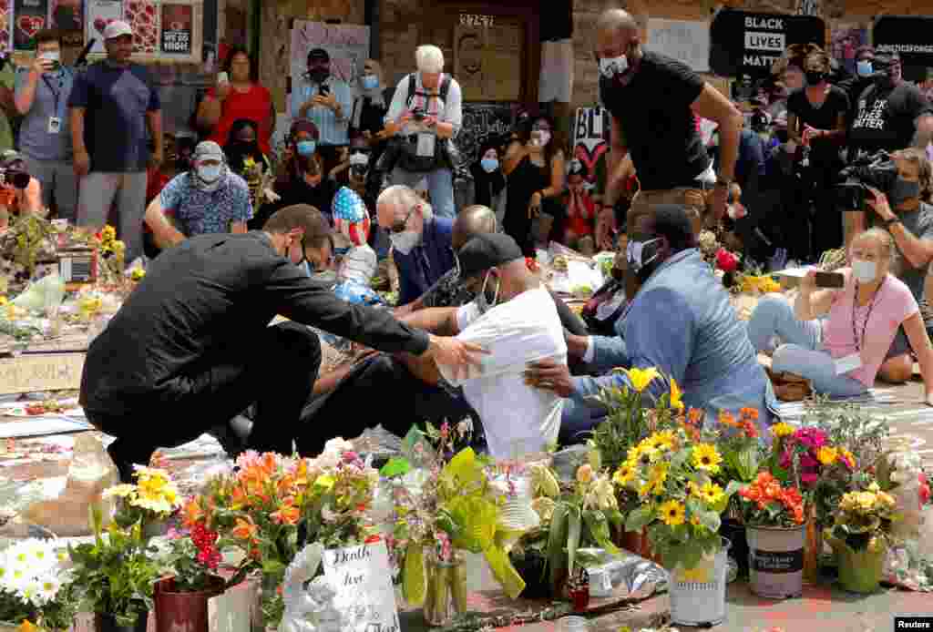Terrence Floyd, brother of George Floyd, reacts at a makeshift memorial honoring George Floyd, at the spot where he was taken into custody, in Minneapolis, Minnesota, June 1, 2020.