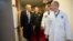 President Donald J. Trump talks with, from left to right, with Capt. Mark Kobelja, director of Walter Reed National Military Medical Center; Dr. Ronny Jackson, physician to the president; and Dr. James Jones, physician to the president and medical director of the Medical Evaluation and Treatment Unit, Jan. 12, 2018, in Bethesda, Md., following the president’s annual physical at the medical facility. 