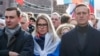 FILE - Russian opposition politicians Alexei Navalny, Lyubov Sobol and Ivan Zhdanov take part in a rally to mark the 5th anniversary of opposition politician Boris Nemtsov's murder, in Moscow, Feb. 29, 2020.