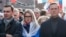 FILE - Russian opposition politicians Alexei Navalny, Lyubov Sobol and Ivan Zhdanov take part in a rally to mark the 5th anniversary of opposition politician Boris Nemtsov's murder, in Moscow, Feb. 29, 2020.