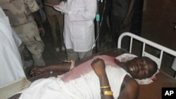 A student wounded during a suicide bomb attack at the College of Administrative and Business Studies receives treatment at a hospital in Potiskum, Nigeria, May 8, 2015.