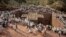 FILE - Ethiopian Orthodox pilgrims attend a prayer session at the monolithic Orthodox church ahead of Ethiopian Christmas in Lalibela, Ethiopia, Jan. 6, 2018. 