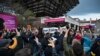 People take part in a protest organized by the Slovakian opposition parties in Bratislava on March 27, 2024, over a plan by the government of populist Prime Minister Robert Fico to take over the public television and radio broadcaster.