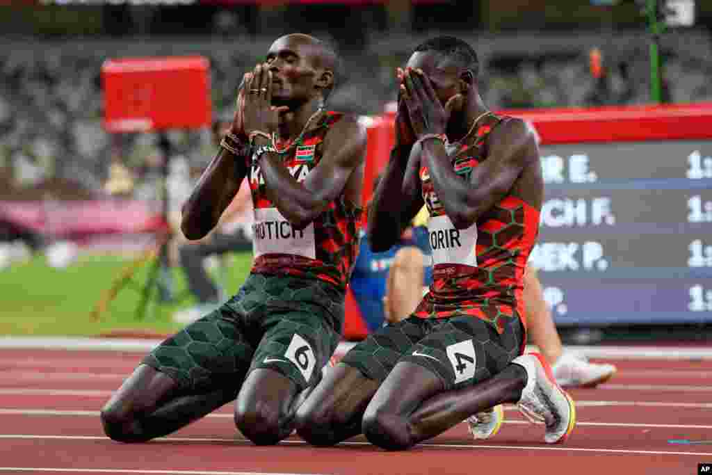 Emmanuel Korir, right, of Kenya, celebrates after winning the gold medal with silver medalist Ferguson Rotich, also of Kenya, in the men&#39;s 800-meter final at the 2020 Summer Olympics in Tokyo, Japan.