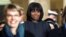 First lady Michelle Obama walks on Capitol Hill, Jan. 21, 2013, for President Barack Obama's ceremonial swearing-in ceremony.