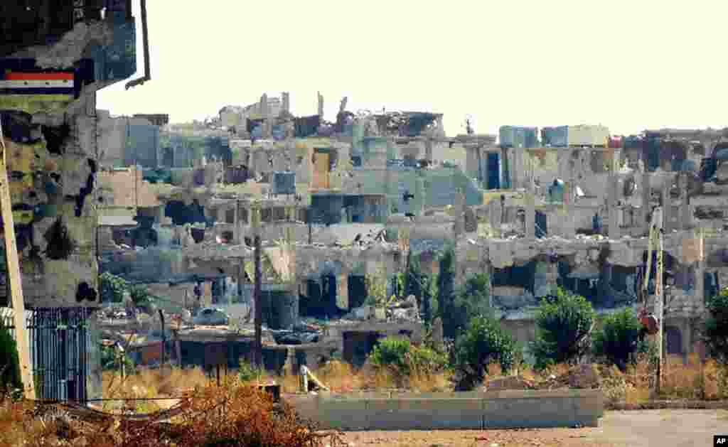 Destroyed houses, the result of shelling by Syrian government forces, in the Baba Amr neighborhood of Homs province, Syria, October 18, 2012. 