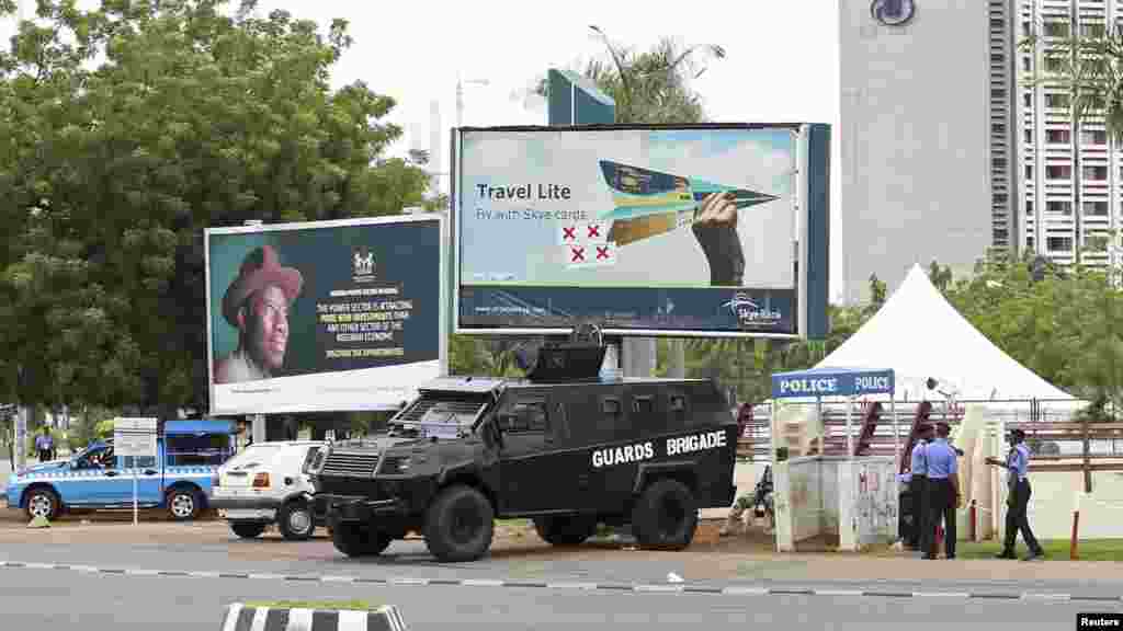 An armored vehicle is stationed outside the venue for the World Economic Forum on Africa (WEFA) meeting in Abuja, May 7, 2014. 